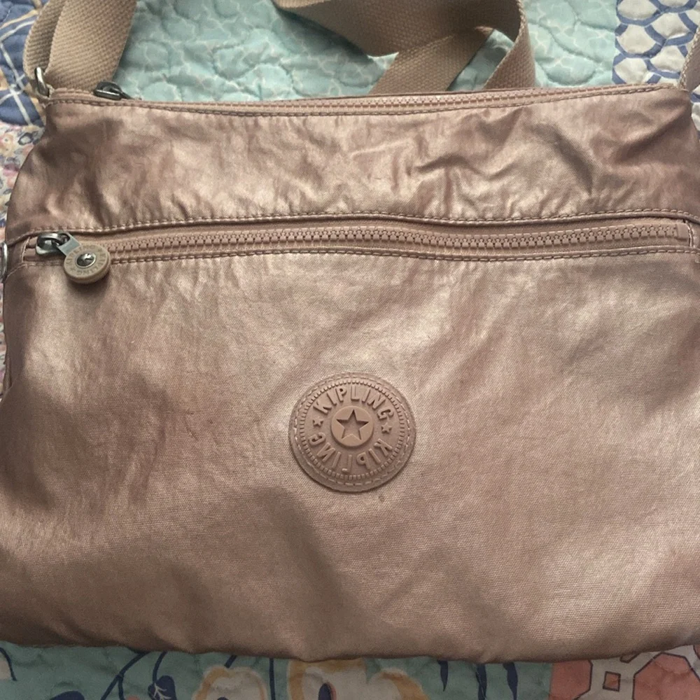Rose Gold Kipling Pink Crossbody Bag with Signature Style